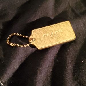 Coach bag tag